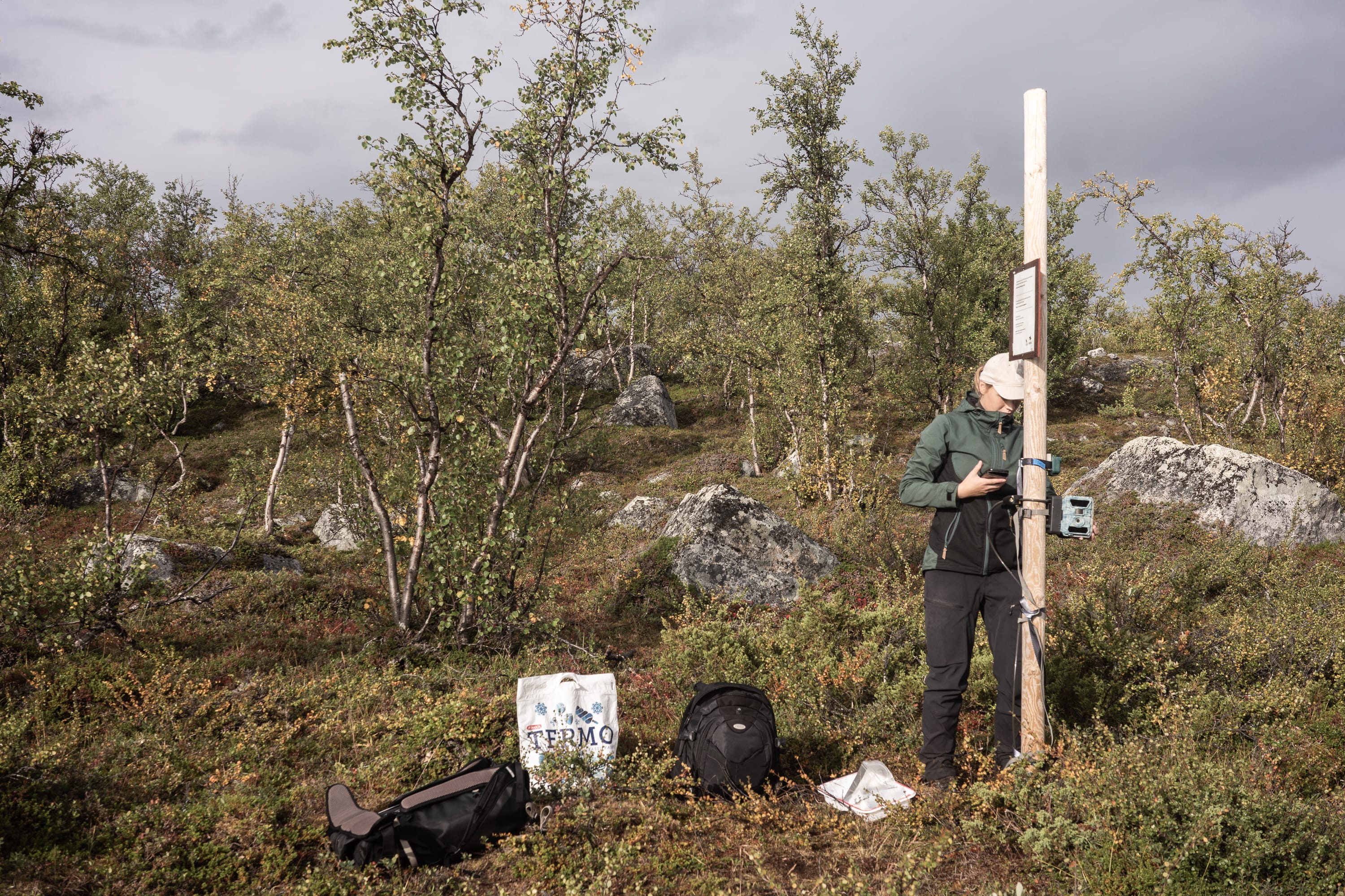 Observing Silja changing the batteries of a ranger camera and microphone for the Lifeplan project